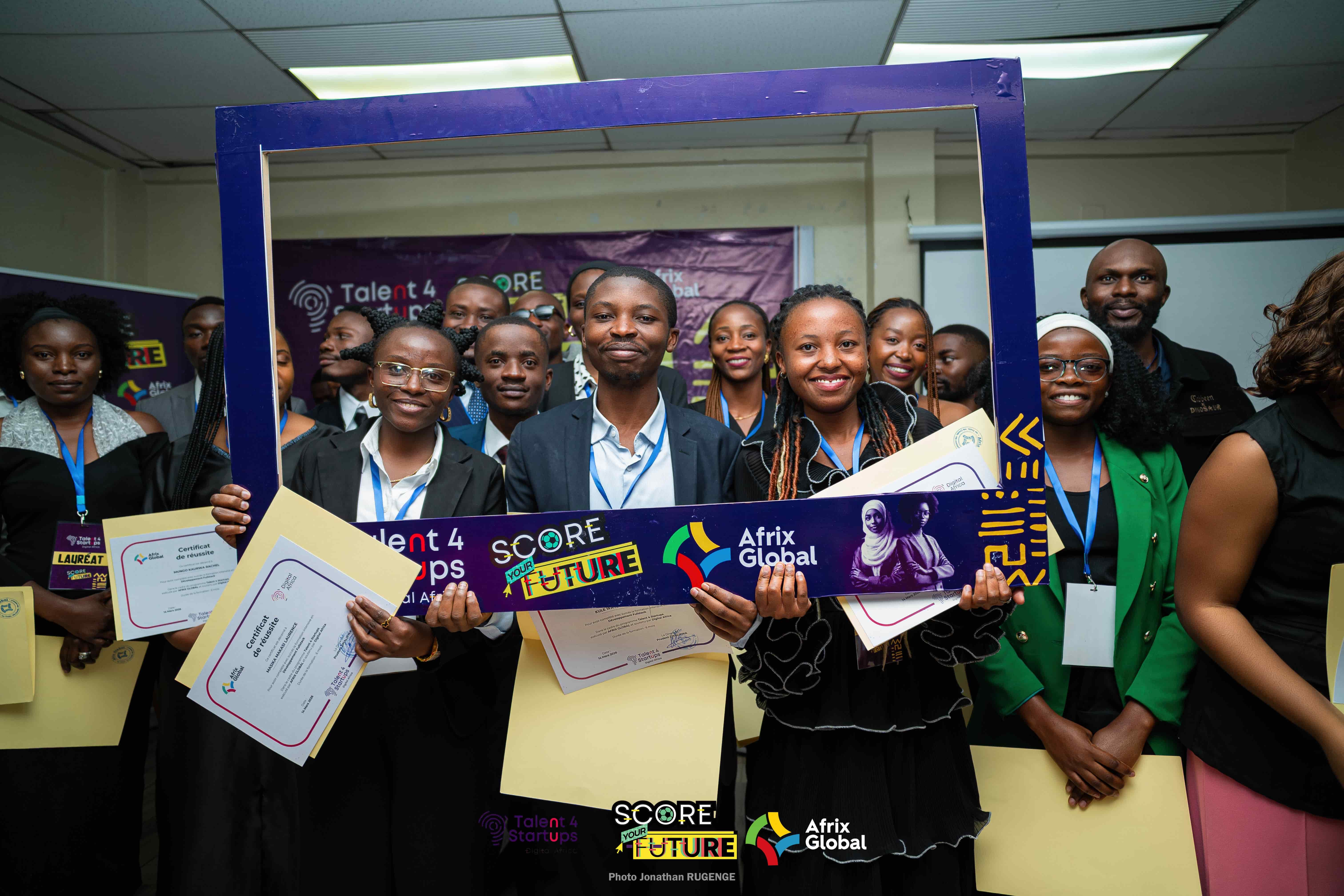 Young African digital professionals collaborating in a modern tech office