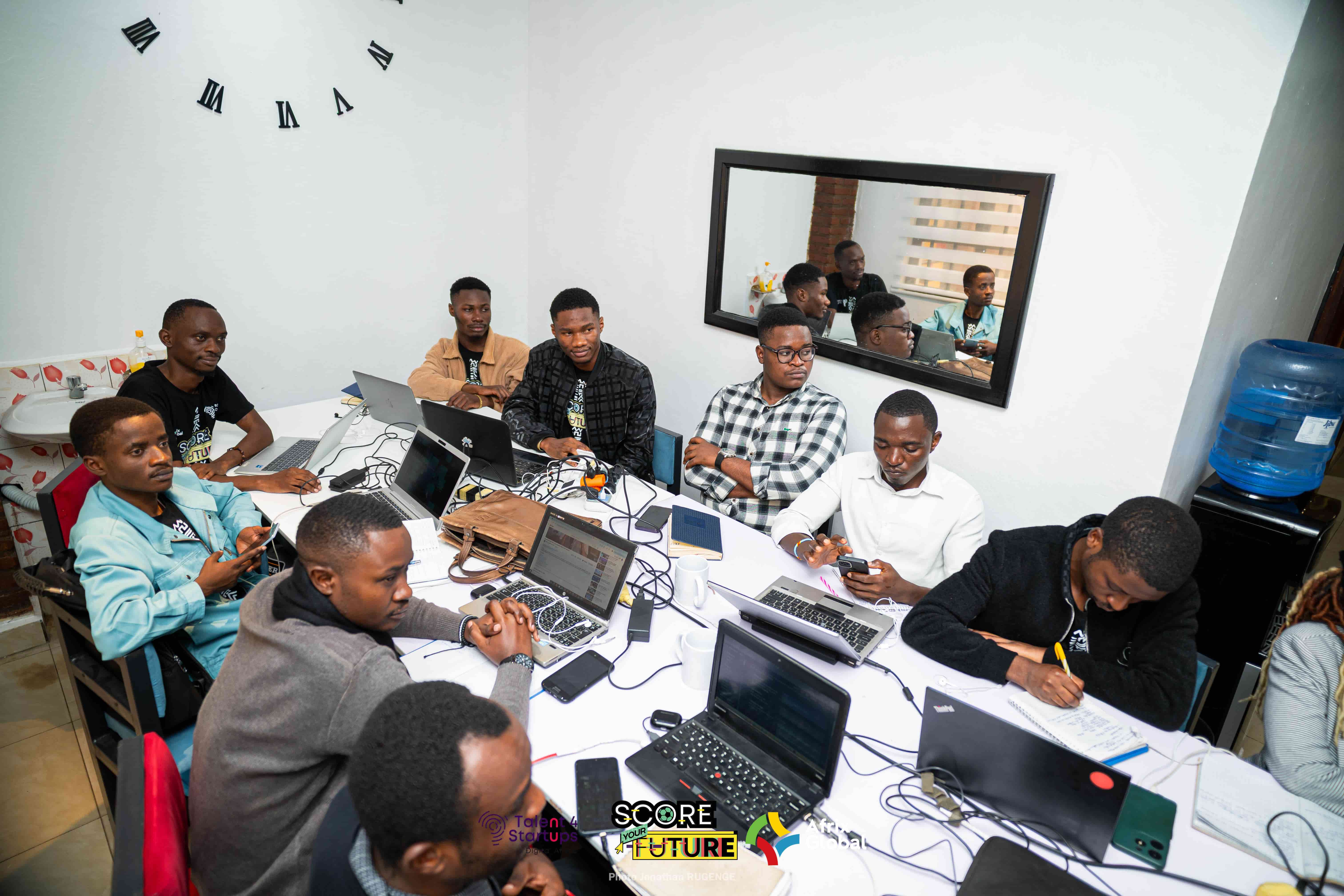 Afrix Global designers and developers at work